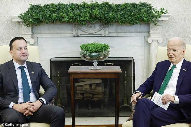 It's in the cards: President Joe Biden holds a note card ahead of his oval office meeting with Irish Prime Minister Leo Varadkar