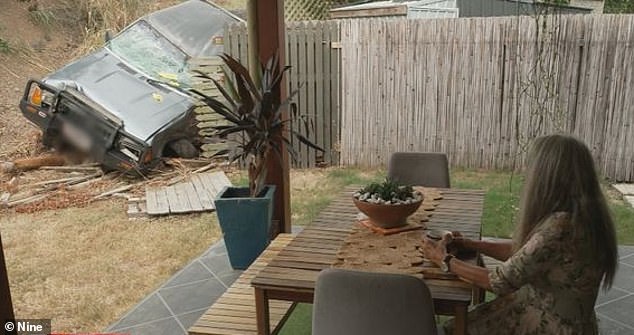 A crashed car (pictured) sat in the back garden of Josephine's Gladstone home for two weeks after an allegedly drunk driver crashed through her gate