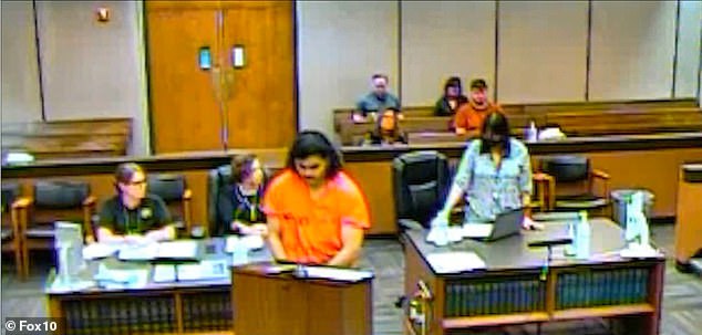 On Monday, Court Commissioner Barbara Spencer said Raas Almansoori, 26, will remain in Arizona.  He is seen in court Monday with his head bowed as he listened to the judge's ruling