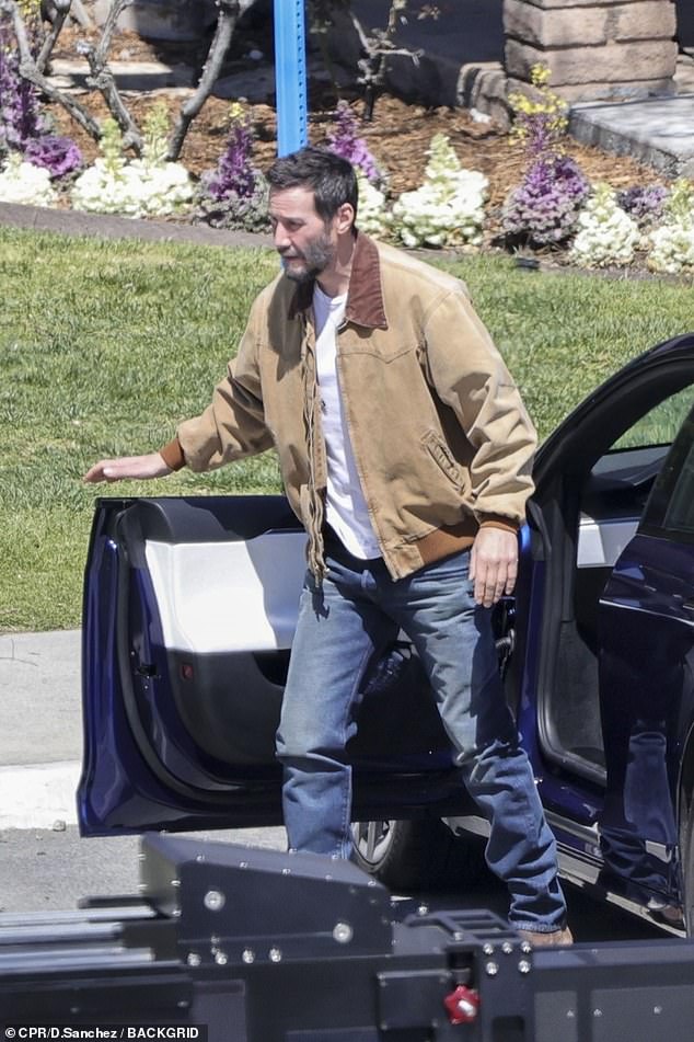 Keanu Reeves was spotted on the set of his new movie Outcome with a short haircut on Wednesday - just weeks after sporting much longer locks