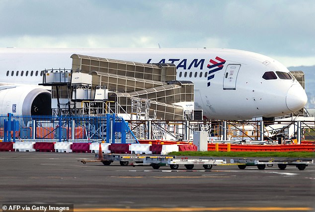 The Latam Airlines Boeing 787 Dreamliner aircraft that suddenly lost altitude in flight a day earlier is seen on the tarmac of Auckland International Airport in Auckland on March 12, 2024