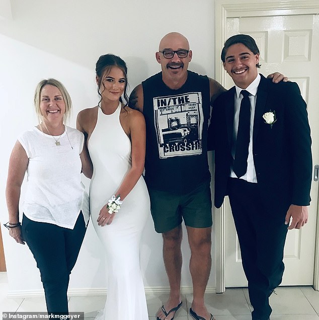 Mark Geyer (second from right) broke down in tears after receiving the news that his son Mavrik (right) will make his NRL debut for the Panthers on Thursday evening