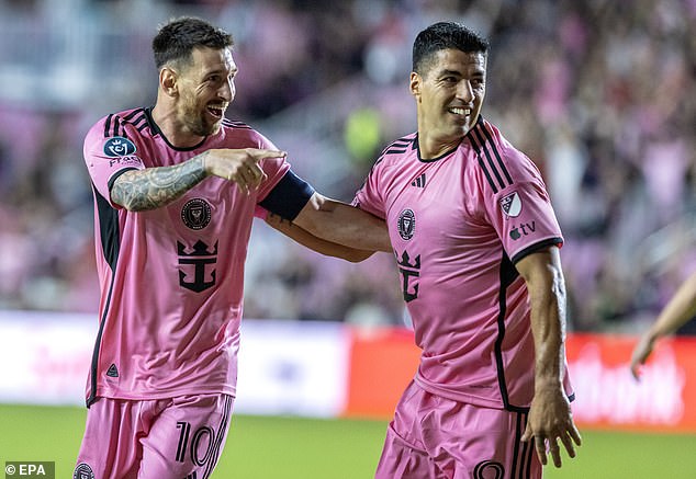 Lionel Messi (left) celebrates with friend and teammate Luis Suarez during the big win