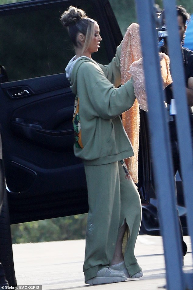 Scheana Shay also stayed comfortable in a light green hoodie that was paired with matching and slightly oversized sweatpants