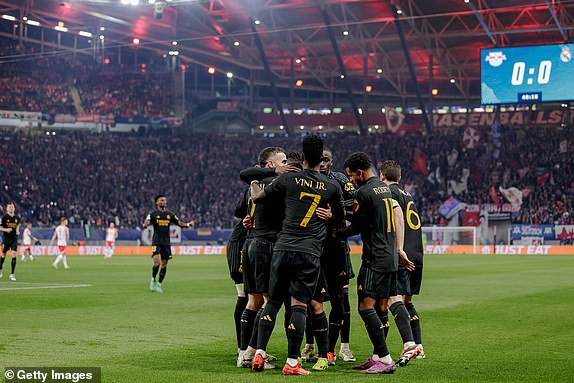 LEIPZIG, GERMANY - FEBRUARY 13: Brahim Diaz of Real Madrid celebrates 0-1 with Dani Carvajal of Real Madrid, Vinicius Jr of Real Madrid, Ferland Mendy of Real Madrid, Rodrygo Goes of Real Madrid, Nacho Fernandez of Real Madrid during the UEFA Champions League match between RB Leipzig and Real Madrid at the Red Bull Arena on February 13, 2024 in Leipzig, Germany (Photo by David S. Bustamante/Soccrates/Getty Images)