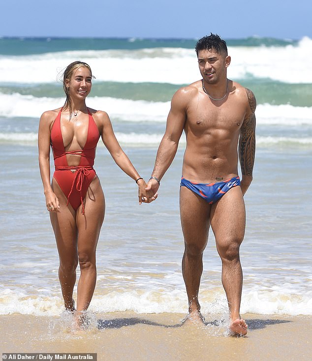 Married at First Sight couple Jade Pywell, 26, (left) and Ridge Barredo, 27, (right) confirmed they're still going strong after quitting the social experiment as they packed on the PDA on a beach on February 11 on the Gold Coast.