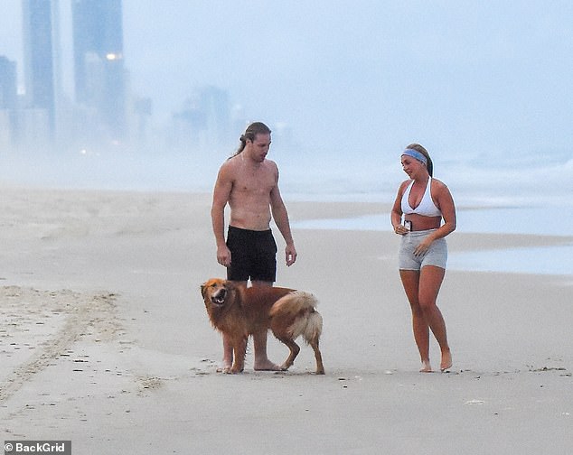 Married At First Sight stars Eden Harper and Jayden Eynaud looked stronger than ever as they took their dog for a walk on Gold Coast Beach on Sunday evening.  Pictured