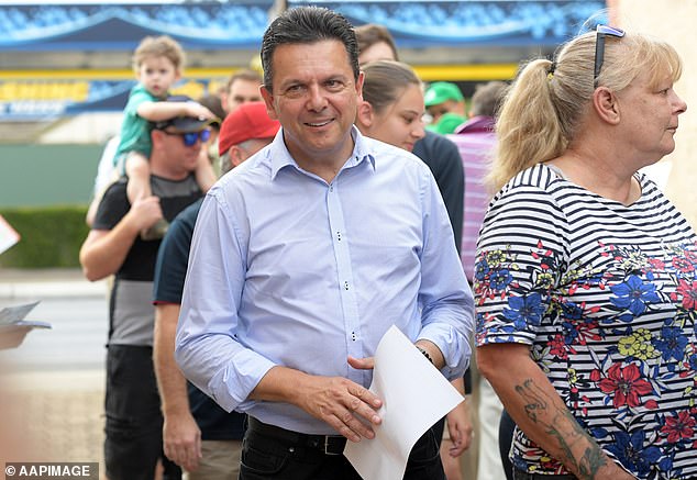 Former political impostor Nick Xenophon (middle of photo) has been diagnosed with a brain tumor that he describes as a 'ticking time bomb'