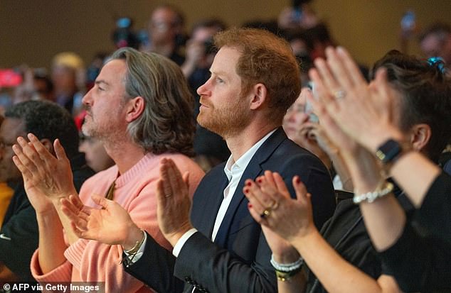 Meghan had opened the discussion with an impassioned speech in which she praised the many women-focused initiatives she and Prince Harry (pictured in the crowd) had worked on through their non-profit organization, the Archewell Foundation.