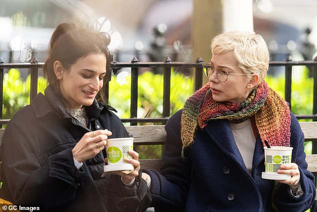 Michelle Williams and Jenny Slate were spotted sitting on a park bench while filming a scene where they talked and ate soup from a Styrofoam cup