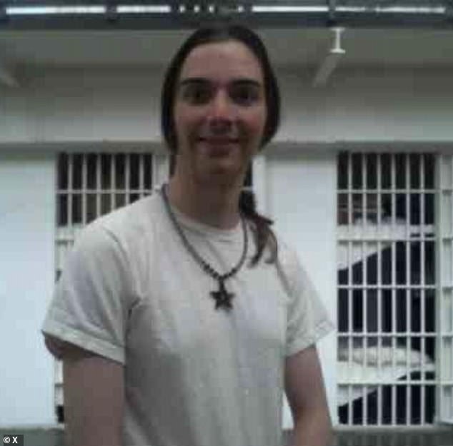 The convicted murderer who murdered his parents before turning into a woman was discovered having sex with a female inmate at a women's prison in Washington state.  (Photo: Kim in prison, after her 'transition')