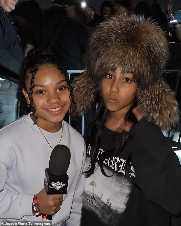 North West (R) gave her first on-camera interview last Thursday about her debut album Elementary School Dropout with the 13-year-old reporter (L) behind Jazzy's World TV during Rolling Loud California