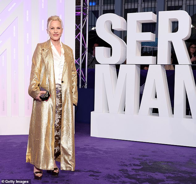 Dressed in a stunning gold coat and matching metallic skirt, the Boyhood actress arrived as guest of honor and took over the red carpet