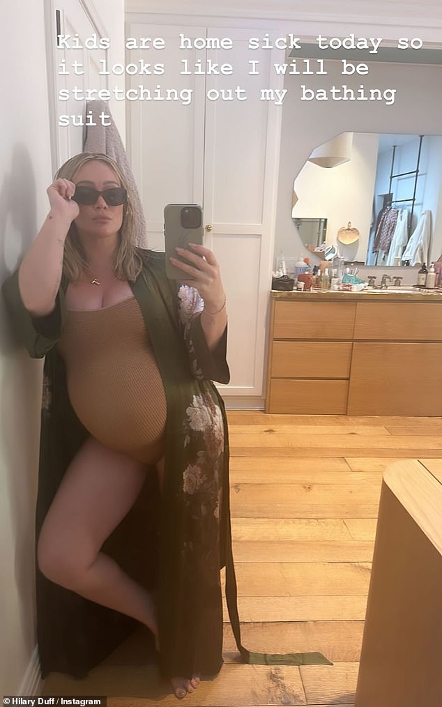 Hilary Duff, 36, showed off her growing baby bump as she donned a one-piece swimsuit in a new selfie uploaded to her Instagram Stories on Friday