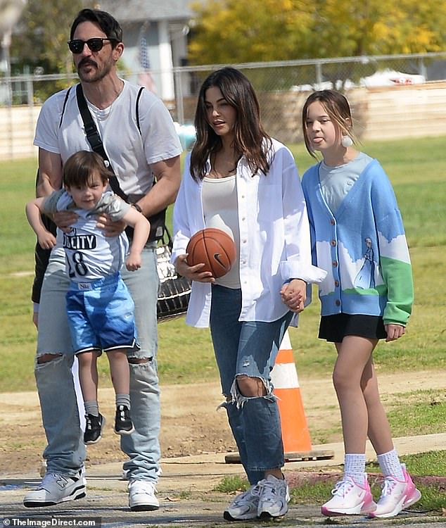 Jenna Dewan showed off her baby bump with a white T-shirt while visiting a park with her family in Los Angeles on Saturday afternoon