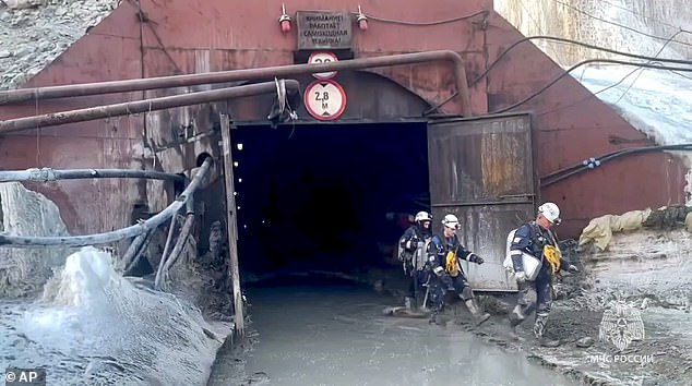 A rescue mission is underway in Russia to save the lives of 13 miners trapped in a collapsed gold mine after a cliff fall