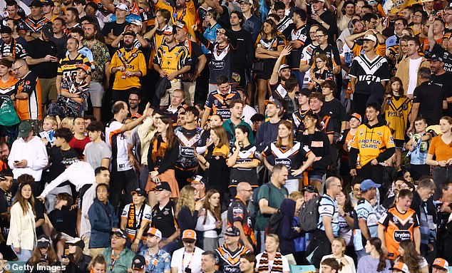 A capacity crowd of 16,000 packed into the Leichhardt Oval for the clash between the Tigers and Sharks.  There is no suggestion that anyone in this image has engaged in offensive language