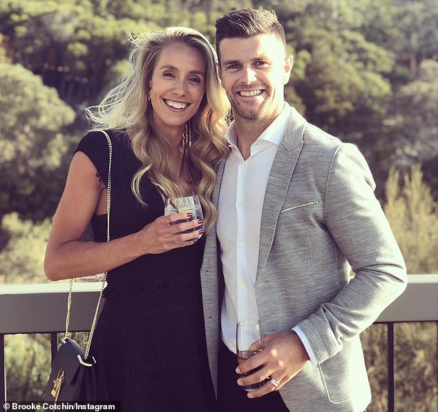 Cotchin (pictured with wife Brooke) invited Martin to live in his family home when he was dealing with off-field drama