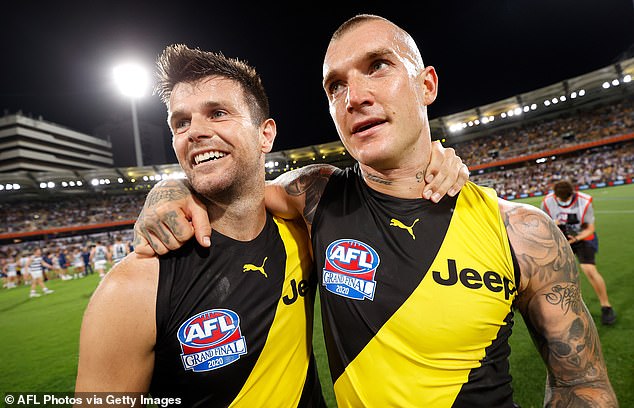 AFL legend Trent Cotchin (pictured left) has revealed Dustin Martin's bizarre act that put him on edge when they lived together as emerging footballers in Richmond