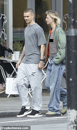 The stylish duo kept it casual as the son of David and Victoria Beckham opted for Supreme sweatpants and a gray t-shirt