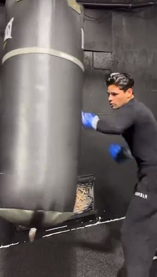 The troubled boxer shared a video of himself hitting the heavy bag