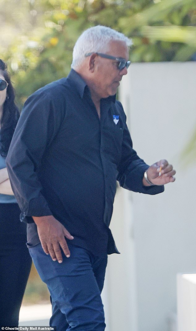 The father of Matildas captain Sam Kerr has refused to discuss his daughter's charge of racially abusing a London police officer.  Roger Kerr is pictured outside the Perth home he shares with Sam's mother on Wednesday