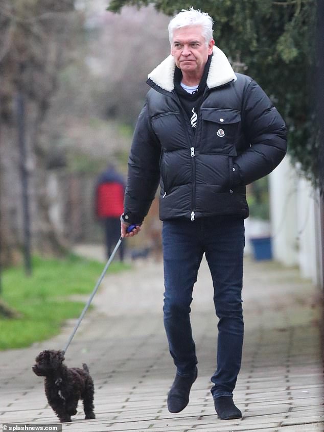 Embarrassed former This Morning presenter Phillip Schofield cut a somber figure as he walked his puppy in West London on Monday as the new presenters made their debut