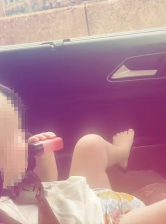 This is when the young toddler takes a hit of the vape while sitting in a car seat