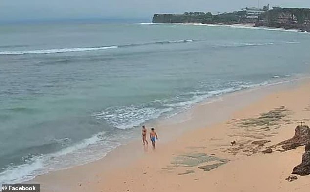 A member of the Bali Travel Forum Facebook group yesterday shared this webcam screenshot of two people walking on the beach during Nyepi, which could attract a large fine