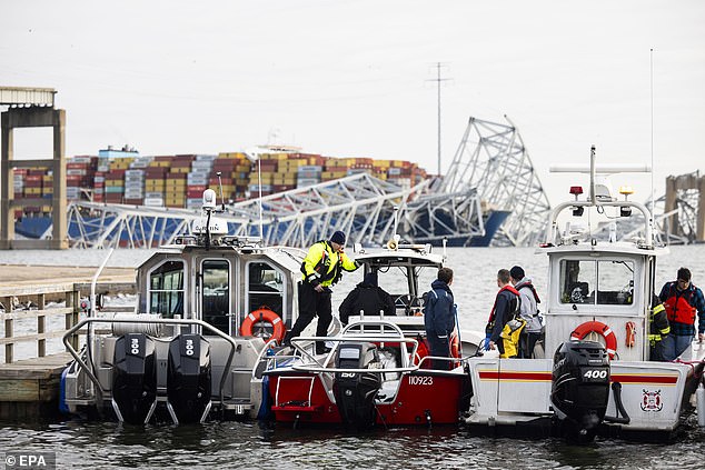 Rescue teams search the Patapsco River in the aftermath of the bridge collapse, leaving vehicles submerged and workers missing