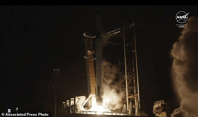 The SpaceX Falcon rocket is seen during liftoff as it heads to the International Space Station from Launch Pad 39-A on Sunday at the Kennedy Space Center in Cape Canaveral, Florida