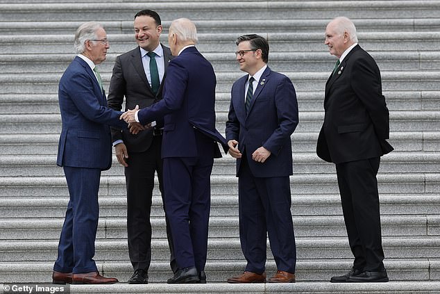 President Joe Biden (C) and Irish Prime Minister Leo Varadkar are greeted by Speaker Mike Johnson (second from right) after arriving at the US Capitol