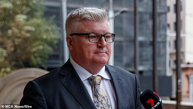 MacGill is pictured outside Sydney's Downing Center Local Court on Thursday where he entered a plea of ​​not guilty