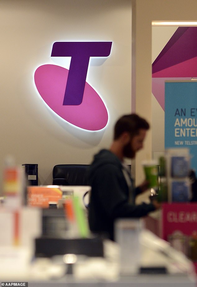 More than 1,900 customers have reported service issues on DownDetector, impacting calling and internet (pictured, a Telstra store in Brisbane)