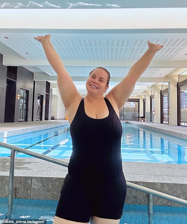 Tennis pro Jelena Dokic (pictured) showed off her figure in a black swimsuit as she shared an inspiring message about 'embracing and loving your body'
