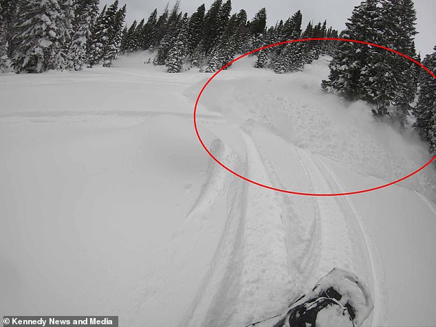 The avalanche rushes towards Mason Zak.  Zak and Jake Dahl were both buried under five feet of snow while on a day hike with friends in Star Valley