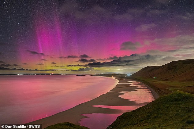 If a solar storm hits Earth, the Northern Lights are likely to be visible over parts of Britain and the US.  A similar storm was responsible for the beautiful aurora visible over Gower, Wales earlier this month (pictured).