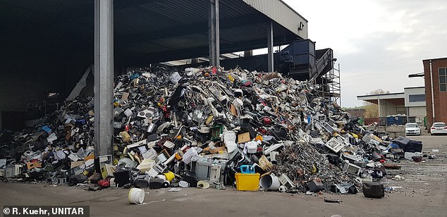 A shocking report shows that the world generated 62 million tons of electronic waste in 2022, including thousands of tons of abandoned solar panels.  This image shows piles of waste waiting for recycling at a center in Germany