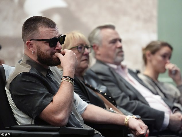 Travis Kelce cries as he sits alongside his mom Donna