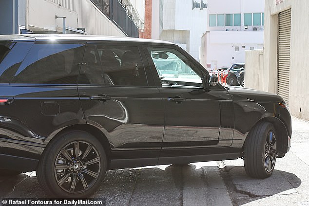 Travis Kelce was spotted in a black Range Rover on his way to the gym in LA on Wednesday