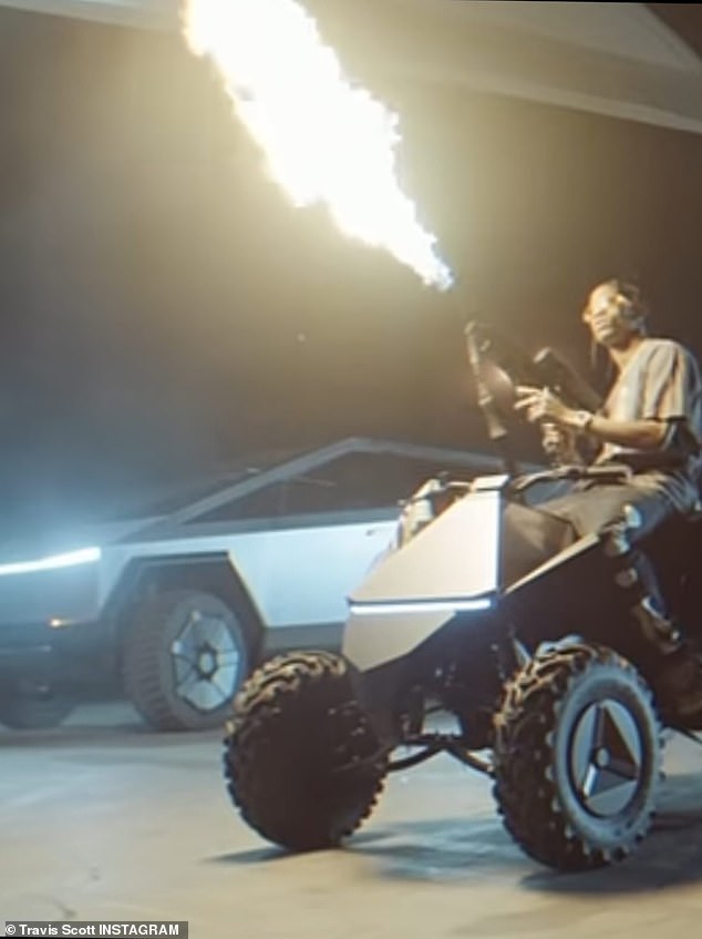 Travis Scott showed off his new Tesla Cybertruck and Cyberquad ATV on Thursday.  The 32-year-old rapper took to Instagram to share photos of him with his huge truck and his electric ATV, the first of its kind from Tesla, while firing a flamethrower