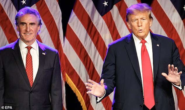 Former President Donald Trump (right) benefited in the state from the support of North Dakota Governor Doug Burgum (left), who ran for president from June to December and announced his support for Trump in January ahead of the Iowa caucuses