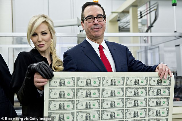 Donald Trump's former Treasury Secretary Steve Mnuchin has revealed he is gathering a group of investors to try to buy TikTok.  He is pictured with his wife Louise Linton in 2017