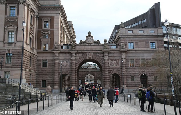 The men had made 'concrete preparations' for an attack 'near the Swedish Parliament in Stockholm', prosecutors said (file image shows the Swedish Parliament buildings