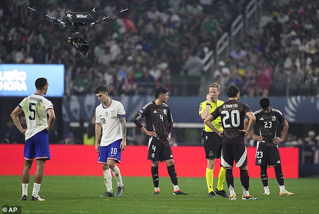 With the US leading 2-0 in the closing minutes, referee Drew Fischer paused the match