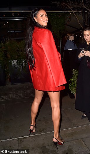 Vick showed off her black Louboutin heels as she entered the party
