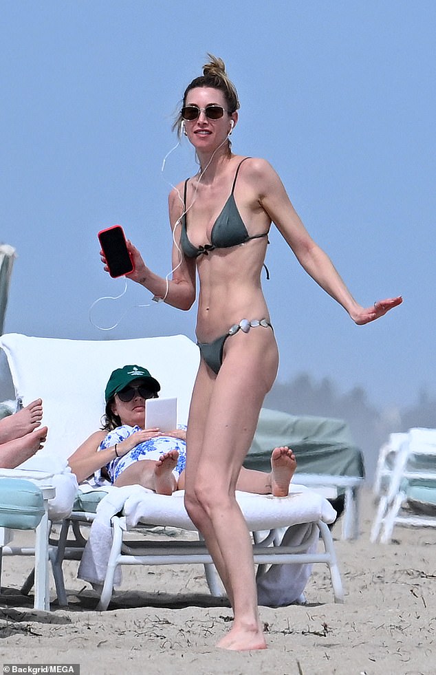 Whitney Port, 38, showed off her washboard abs in a skimpy bikini as she enjoyed her Florida getaway in Palm Beach on Friday