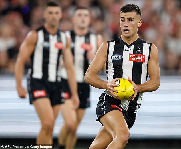 Microchip technology will be fitted to Sherrin balls used at VFL level this weekend (pictured, Collingwood star Nick Daicos in action against Sydney)