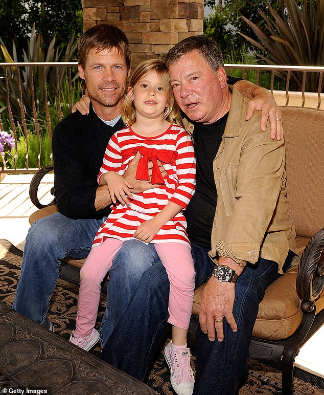 William previously confessed that he decided to make the documentary about his life as a way to 'reach out' to his grandchildren after his death (pictured with granddaughter Kaya and son-in-law Joel Gretsch in 2008)