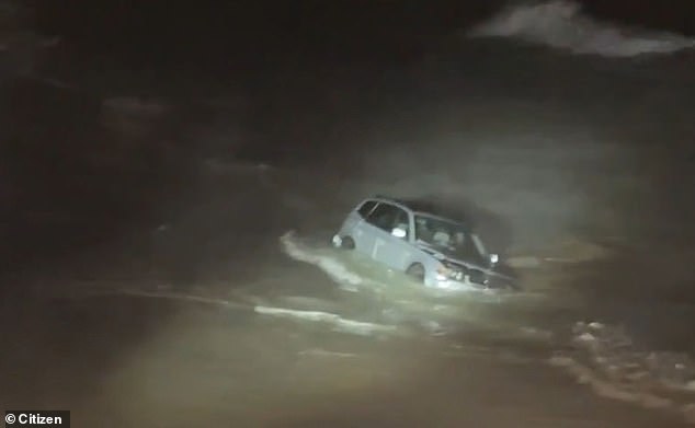 A woman was rescued from the Pacific Ocean on Sunday after driving her SUV into the sea during a high-speed chase with the LAPD
